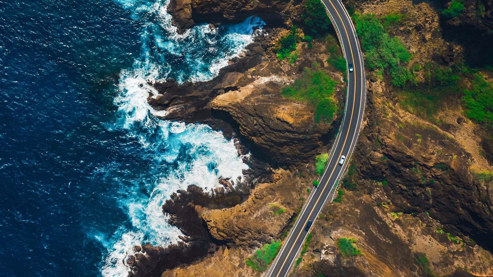 A scenic view of a coastal European town overlooking the Mediterranean Sea